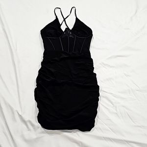 Black mini dress.  Size M. New without Tags. Boutique Juniors Fashion